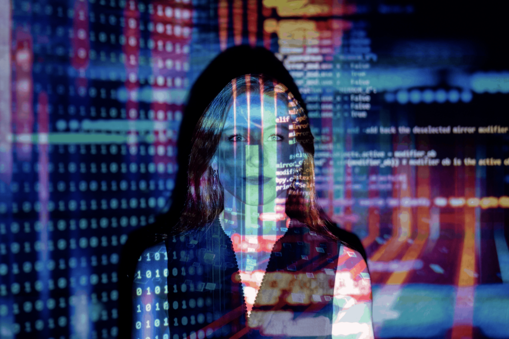 woman-standing-in-front-of-code-on-screen